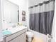 Bathroom featuring a vanity, toilet and tub/shower combo at 360 Lincoln W Cir, Fortville, IN 46040