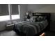 Comfortable bedroom features a plush bed with pillows and a stylish headboard for a relaxing retreat at 360 Lincoln W Cir, Fortville, IN 46040