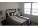 Cozy bedroom with soft lighting, comfortable bed, and convenient nightstands for a restful ambiance at 360 Lincoln W Cir, Fortville, IN 46040