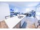 Spacious, open-concept kitchen with a large island, stainless steel appliances, and a seamless flow to the living area at 360 Lincoln W Cir, Fortville, IN 46040