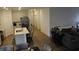 Open-concept living area with modern kitchen, dining table, and comfortable couch at 360 Lincoln W Cir, Fortville, IN 46040
