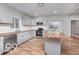 Modern kitchen featuring stainless steel appliances, butcher block countertops, and gray cabinets at 3758 Broadway St, Indianapolis, IN 46205