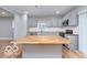 Updated kitchen featuring stainless appliances, butcher block countertops, and an island at 3758 Broadway St, Indianapolis, IN 46205