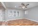 Spacious living area features wood-look floors and abundant natural light at 3758 Broadway St, Indianapolis, IN 46205