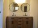 Bathroom with a double sink vanity with drawers and cabinets at 4234 Kingsley Dr, Indianapolis, IN 46205