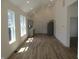 Modern, open kitchen with stainless steel appliances, beautiful wood floors and recessed lighting at 4234 Kingsley Dr, Indianapolis, IN 46205