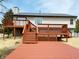Outdoor deck offers an ideal space for relaxing and entertaining with stairs leading down to the backyard at 436 Tavistock Dr, Mooresville, IN 46158