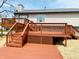 A multi-level deck shows off outdoor living space and is perfect for entertaining with access to the home's second story at 436 Tavistock Dr, Mooresville, IN 46158