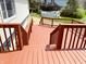 Outdoor deck features stairs leading down to the backyard and an above ground pool, ideal for recreation and relaxation at 436 Tavistock Dr, Mooresville, IN 46158