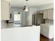 Bright kitchen features stainless steel appliances, stylish counters, and an open design at 436 Tavistock Dr, Mooresville, IN 46158