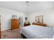 Bright bedroom with neutral walls, carpet, and a ceiling fan, creating a serene and comfortable space at 4557 Marigold Ct, Greenwood, IN 46143