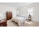 Bright bedroom with light-colored walls, carpet, and natural light from windows at 4557 Marigold Ct, Greenwood, IN 46143