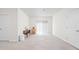 Bright, neutral living room with sliding door, carpet, and classic furniture at 4557 Marigold Ct, Greenwood, IN 46143