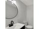 Bathroom featuring modern fixtures, vanity, and mirror at 4775 E 56Th St, Indianapolis, IN 46220