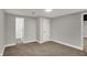 Carpeted bedroom featuring two closets and neutral paint at 4775 E 56Th St, Indianapolis, IN 46220