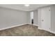 Bedroom with carpet, neutral paint and trim, and closet at 4775 E 56Th St, Indianapolis, IN 46220