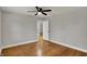 Bedroom with hardwood flooring and a ceiling fan for comfort at 4775 E 56Th St, Indianapolis, IN 46220