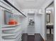 Walk-in closet showcasing custom shelving and storage solutions for optimal organization and style at 4917 Melbourne Rd, Indianapolis, IN 46228