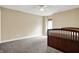 Bedroom with carpet, ceiling fan and natural light from window at 5212 Knollton Rd, Indianapolis, IN 46228