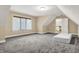 Spacious bedroom with plush carpeting and natural light perfect for relaxation and comfort at 5212 Knollton Rd, Indianapolis, IN 46228