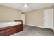 Bedroom with carpet, ceiling fan and built-in bedframe at 5212 Knollton Rd, Indianapolis, IN 46228