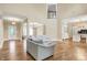 Spacious living room with hardwood floors, a fireplace, and plenty of natural light at 5212 Knollton Rd, Indianapolis, IN 46228