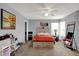 Cozy bedroom featuring neutral walls, ceiling fan, and decorative accents at 5453 Nighthawk Way, Indianapolis, IN 46254