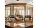Close up on granite countertops and large kitchen island with bar seating at 553 Bolderwood Ln, Carmel, IN 46032