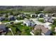 Aerial view of a neighborhood with well-maintained homes, and lots of mature trees at 5895 Sugar Pine Dr, Avon, IN 46123