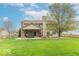 Spacious, well maintained backyard with patio and view of neighboring houses at 5895 Sugar Pine Dr, Avon, IN 46123