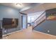 Spacious basement with stairs, living area, and game room visible at 5895 Sugar Pine Dr, Avon, IN 46123