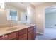 Bathroom features a double vanity and a view into the adjacent bedroom at 5895 Sugar Pine Dr, Avon, IN 46123
