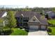 Beautiful two-story brick home with a well-manicured lawn and three-car garage at 5895 Sugar Pine Dr, Avon, IN 46123