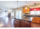 Bright kitchen with an island, granite countertops, and an open layout at 5895 Sugar Pine Dr, Avon, IN 46123