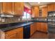 Well-equipped kitchen with wooden cabinets, countertops, and appliances at 5895 Sugar Pine Dr, Avon, IN 46123