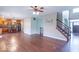 Spacious living area with hardwood floors and seamless flow into the kitchen at 5895 Sugar Pine Dr, Avon, IN 46123