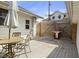 Backyard patio with outdoor seating, wooden fence and a grill at 617 Carlyle Pl, Indianapolis, IN 46201