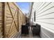 Backyard patio with seating and wooden fence at 617 Carlyle Pl, Indianapolis, IN 46201