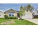 Charming single-story home featuring brick and vinyl siding, attached garage, and well-maintained lawn at 6218 Churchman Way, Indianapolis, IN 46237