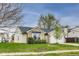 Charming single-story home featuring brick and vinyl siding, attached garage, and well-maintained lawn at 6218 Churchman Way, Indianapolis, IN 46237
