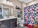 Bathroom with dark cabinets and updated sink at 6502 E Walton Dr, Camby, IN 46113