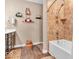 Bright bathroom with bathtub, stylish fixtures, and tasteful decor for a spa-like ambiance at 6502 E Walton Dr, Camby, IN 46113