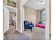 Bedroom featuring ample natural light, a comfortable chair, and a view into another room at 6502 E Walton Dr, Camby, IN 46113
