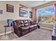 Bedroom with large window and comfortable seating area at 6502 E Walton Dr, Camby, IN 46113