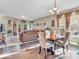 This dining area features hardwood floors and neutral color scheme with views into the Gathering room at 6502 E Walton Dr, Camby, IN 46113