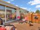 Charming outdoor patio with comfortable seating, awning, and peaceful backyard views at 6502 E Walton Dr, Camby, IN 46113