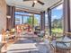 Enclosed sunroom with brick accents and ceiling fan at 6502 E Walton Dr, Camby, IN 46113