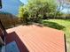 Large wood back deck perfect for entertaining and enjoying nature at 653 Southridge Ct, Westfield, IN 46074