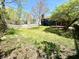Large backyard, wood fence and nice mature trees at 653 Southridge Ct, Westfield, IN 46074