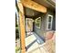 Inviting entryway showcasing a decorative glass door, new wood post, and brick accents at 653 Southridge Ct, Westfield, IN 46074